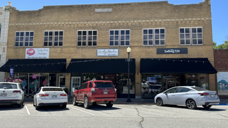 Wide view of the downtown Harrison property owned by Selling 726 Realty, showing its completed window improvements and three storefronts.